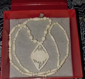 Vintage ivory rose carved pendant necklace